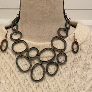 Copper Necklace with adjustable closure. Matching earrings